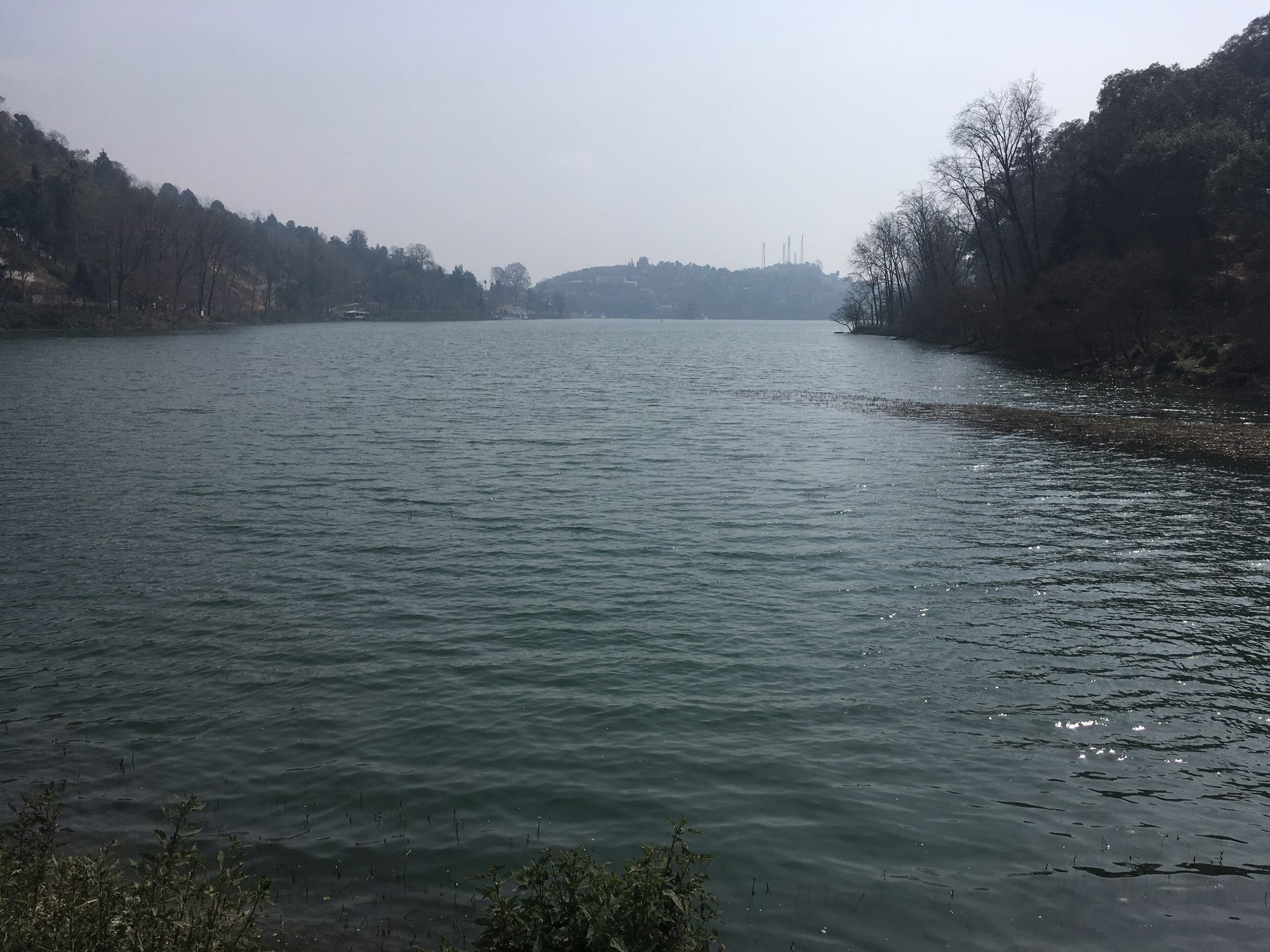 Bhimtal lake on a clear winter morning below the Kumaon hills