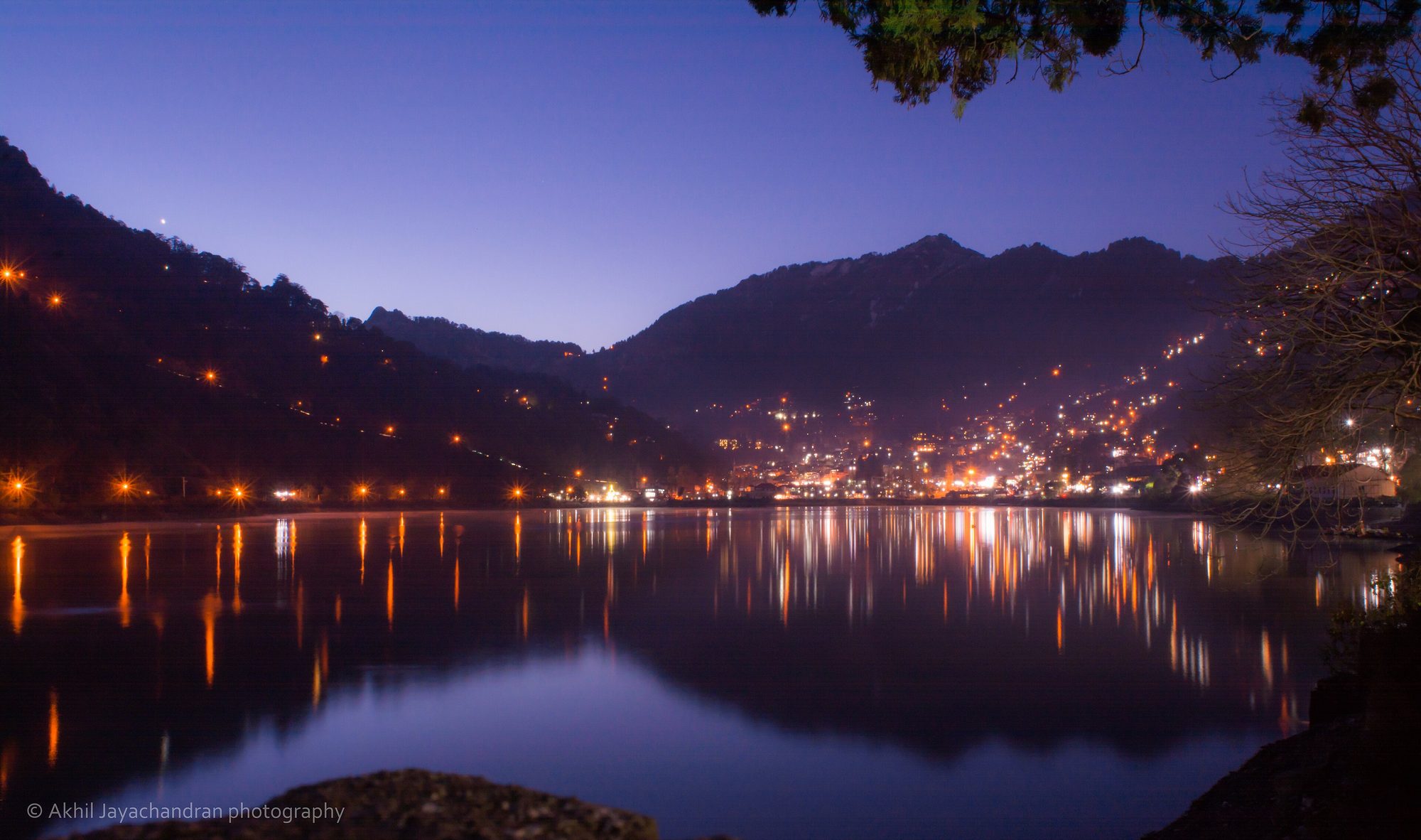 Nainital town lights reflected in Naini Lake at night